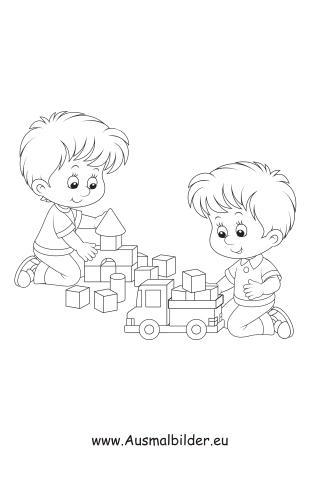 Jungen spielen mit Baukloetzen